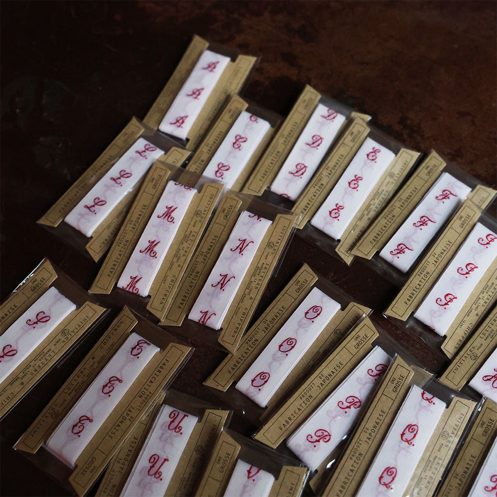 Initial Ribbon - Famous | Online Store